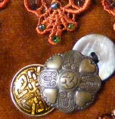 crazy quilt detail of vintage buttons