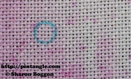 how to hand embroider a buttonhole eyelet flower step 1
