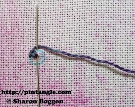 how to hand embroider a buttonhole eyelet flower step 3