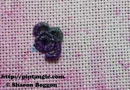 how to hand embroider a buttonhole eyelet flower step 8
