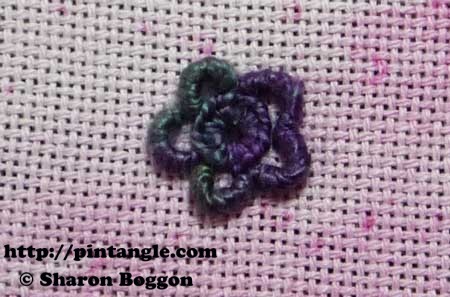 hand embroidered buttonhole eyelet flower sample 