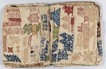 17th Century fabric hand embroidery sample book