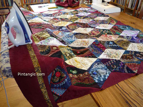 Assembling a crazy quilt adding a border