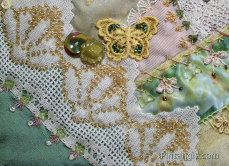 Embroidered and beaded lace demonstrating the idea for embellishing crazy quilt blocks