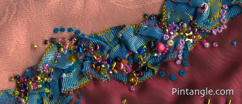 Ruched ribbon and beads demonstrating the idea for embellishing crazy quilt blocks