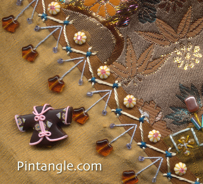 Embroidered ribbon demonstrating the idea for embellishing crazy quilt blocks